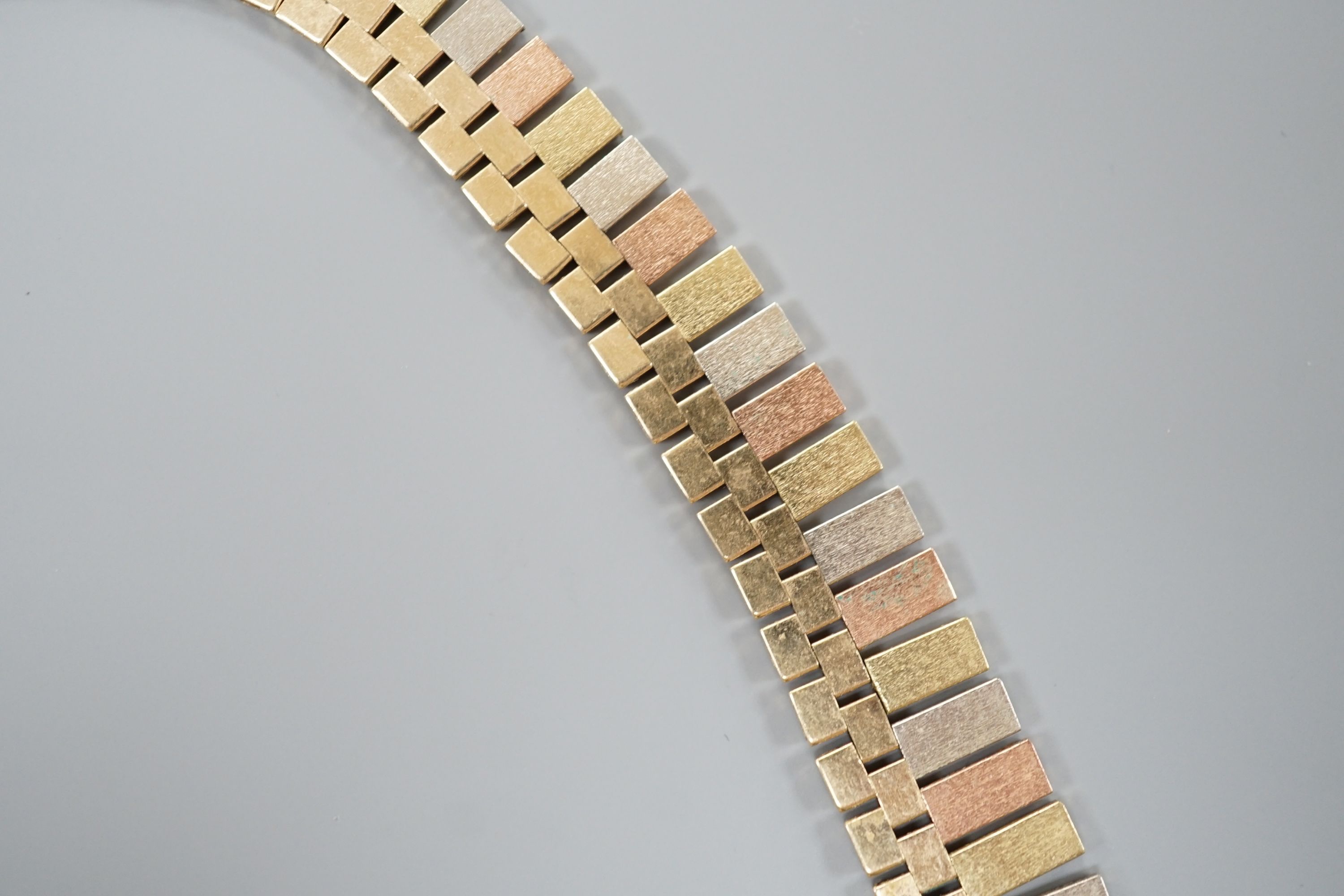 A modern three colour 9ct gold fringe necklace, 40cm, 46.7 grams.